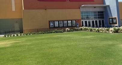 Freshly maintained lawn in front of a building